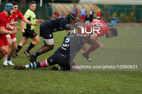 Dwayne Burrows of Energa Ogniwo Sopot is in action, challenged by Uzukhanye Nohe and MJ Atkinson of Juvenia Krakow during the Ekstraliga mat... by Klaudia Radecka/NurPhoto