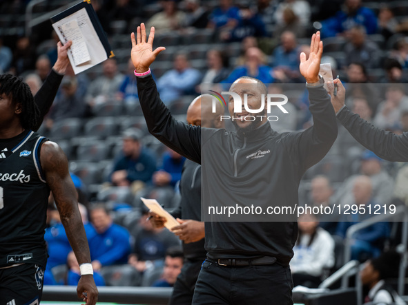 The Saint Peter's Peacocks coaches react during an NCAA basketball game at Prudential Center in Newark, United States, on November 3, 2025.  by Dan Squicciarini/NurPhoto