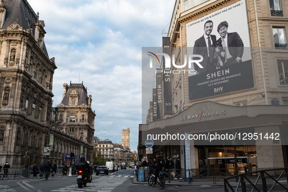 An overview of large banners and promotional visuals for Shein includes a giant poster depicting Frederic Merlin, president of the SGM group... by Jerome Gilles/NurPhoto