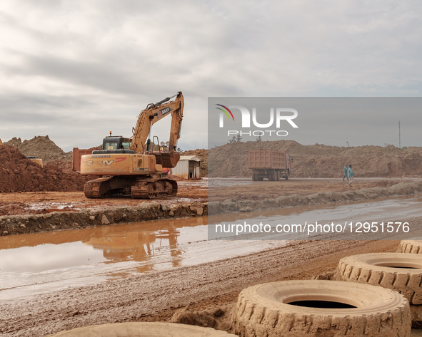 Miners collect nickel raw materials near a mining company and processing smelter in Kawasi Village, Obi Island, South Halmahera Regency, Nor... by Muhammad Fauzy/NurPhoto