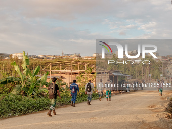 Miners walk towards the mining industry company in Kawasi Village, Obi Island, South Halmahera Regency, North Maluku Province, Indonesia, on... by Muhammad Fauzy/NurPhoto