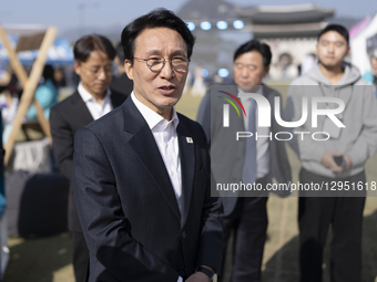 Prime Minister Kim Min-seok enters the ''Development Cooperation Week Promotion Zone'' at Gwanghwamun Square in Jongno District, Seoul, on N... by Chris Jung/NurPhoto