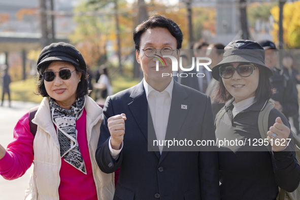 Prime Minister Kim Min-seok poses for a photo with citizens while touring the ''Development Cooperation Week Promotion Zone'' at Gwanghwamun... by Chris Jung/NurPhoto