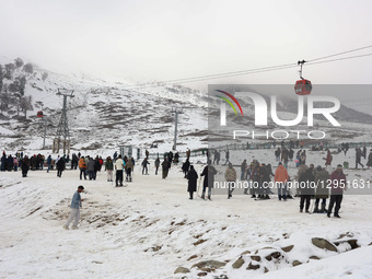 Tourists flock to Gulmarg, a renowned ski resort in Jammu and Kashmir, India, on November 5, 2025, to experience the season's first snowfall... by Nasir Kachroo/NurPhoto