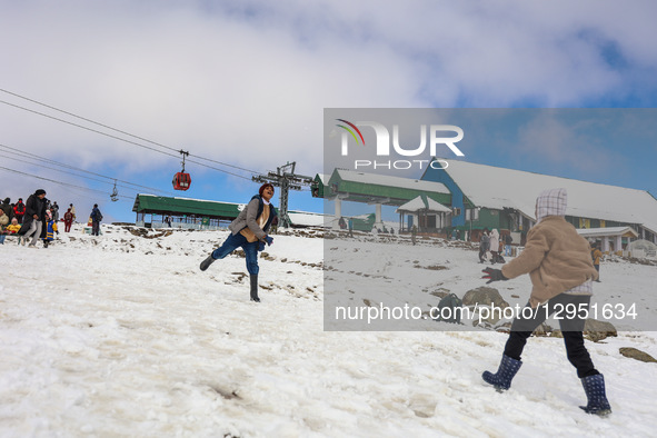 Tourists flock to Gulmarg, a renowned ski resort in Jammu and Kashmir, India, on November 5, 2025, to experience the season's first snowfall... by Nasir Kachroo/NurPhoto