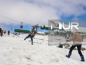 Tourists flock to Gulmarg, a renowned ski resort in Jammu and Kashmir, India, on November 5, 2025, to experience the season's first snowfall... by Nasir Kachroo/NurPhoto