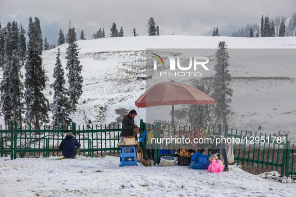 Vendors adjust items as tourists flock to Gulmarg, a renowned ski resort in Jammu and Kashmir, India, on November 5, 2025, to experience the... by Nasir Kachroo/NurPhoto