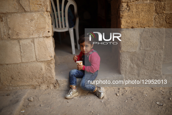 Palestinian children attend a class in the historic ''Al-Kamaliya al-Othmanya'' school in Gaza City's Old Town as part of a volunteer initia... by Majdi Fathi/NurPhoto