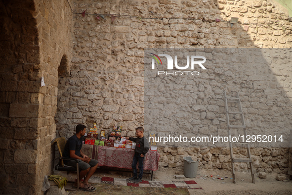 Palestinian children attend a class in the historic ''Al-Kamaliya al-Othmanya'' school in Gaza City's Old Town as part of a volunteer initia... by Majdi Fathi/NurPhoto
