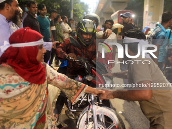 Members of the Job-Seeking Disabled Graduates Council block a road in the Dhaka University and Shahbagh areas in Dhaka, Bangladesh, on Novem... by MD Abu Sufian Jewel/NurPhoto