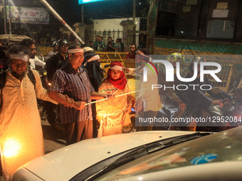 Members of the Job-Seeking Disabled Graduates Council block a road in the Dhaka University and Shahbagh areas in Dhaka, Bangladesh, on Novem... by MD Abu Sufian Jewel/NurPhoto