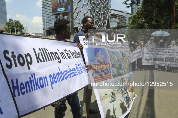 Sudanese refugees gather in front of the United Nations High Commissioner for Refugees (UNHCR) office in Jakarta, Indonesia, on November 3,... by Agoes Rudianto/NurPhoto