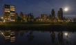 The largest full moon of 2025, a supermoon know as Beaver Moon rises behind residential bu...
