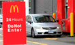 A vehicle waits in the drive-thru at a McDonald's restaurant in Brampton, Ontario, on Nove...