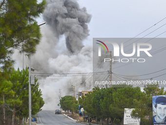 Smoke billows from the area following Israeli attacks on the town of Tayr Dibba in the southern Lebanese province of Tyre, Lebanon, on Novem... by Fadel Itani/NurPhoto