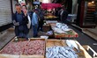 A man sells fish at the Bastille market in the old city of Oran, Algeria, on November 5, 2...
