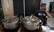 A man sells snails at the Bastille market in the old city of Oran, Algeria, on November 5,...