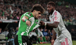 In Seville, Spain, on November 06, 2025, Ainsley Maitland-Niles of Olympique de Lyon grabs...