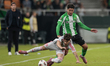 Afonso Moreira of Olympique de Lyon competes for the ball with Pablo Fornals of Real Betis...