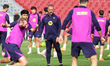 Hansi Flick coaches during FC Barcelona training at the Joan Gamper Sports City before the...