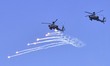 The Indian Air Force aerobatic team performs as part of the 93rd Air Force Day celebration...
