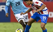 Moises Richards of Panama and Alexis Acosta of Paraguay are in action during the FIFA U-17...