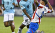 Shayron Stewart of Panama and Jhosias Campss of Paraguay are in action during the FIFA U-1...