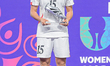 Kim K. Won Sim, number 15, a forward for Korea DPR U-17, receives the Silver Shoe Award at...