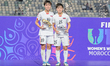 #15 Kim K. Won Sim (Forward) of Korea DPR U-17 holds the Silver Shoe Award, and #10 Yu Y....