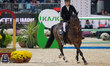 Max Kuhner, from Austria, rides EIC Cornets Lady and is in action during the CSI5*-W Grand...