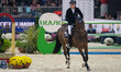 Max Kuhner, from Austria, rides EIC Cornets Lady and is in action during the CSI5*-W Grand...