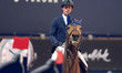 Ben Maher from Great Britain rides Enjeu de Grisien during the CSI5*-W Grand Prix 5, barra...