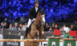 Pieter Devos from Belgium rides Panamarenka van den Blauwaert during the CSI5*-W Grand Pri...