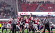 Wisconsin Badgers defensive lineman Ben Barten (68) blocks a Washington Huskies field goal...