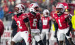 Wisconsin Badgers cornerback Ricardo Hallman (2), cornerback D'Yoni Hill (5), and cornerba...