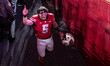 Wisconsin Badgers quarterback Carter Smith (5) celebrates after Wisconsin's 13-10 win over...