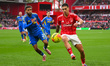Nicolas Dominguez of Nottingham Forest is under pressure from Jayden Bogle of Leeds United...