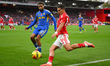 Nicolas Dominguez of Nottingham Forest is under pressure from Jayden Bogle of Leeds United...