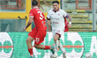 Emiliano Patterello of SS Arezzo and Alessandro Tozzuolo of AC Perugia Calcio compete for...