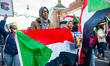 Sudanese people and supporters protest the ongoing war and ethnic cleansing in Sudan durin...