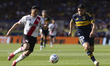 Maximiliano Salas of River Plate and Lautaro Blanco of Boca Juniors fight for the ball dur...