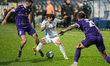 Defender Vladyslav Dubinchak of FC Dynamo Kyiv plays against players of FC LNZ Cherkasy du...