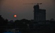 The setting sun is seen on the cityscape of Kolkata, India, on November 10, 2025. 
