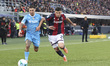 Matteo Politano of SSC Napoli battles for the ball with Nicolo Cambiaghi of Bologna FC dur...