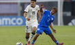 Niklas Scheller of Germany and Kerin Torres of El Salvador play during the FIFA U-17 World...