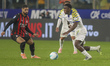 Mandela Keita of Parma AC competes for the ball with Ruben Loftus-Cheek of AC Milan during...