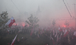 WARSAW, POLAND - NOVEMBER 11, 2025:Crowds march through central Warsaw carrying Polish fl...