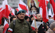 In Warsaw, Poland, on November 11, 2025, participants in the independence march under the...