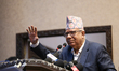 Former Nepali Prime Minister Madhav Kumar Nepal addresses the unification program of the '...