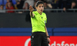 The referee Riem Hussein officiates during the match between FC Barcelona Women and OH Leu...
